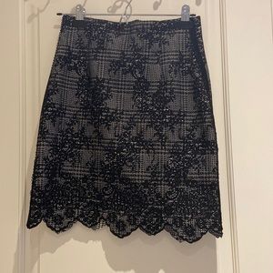 Black Zara A-line skirt with cutouts at bottom